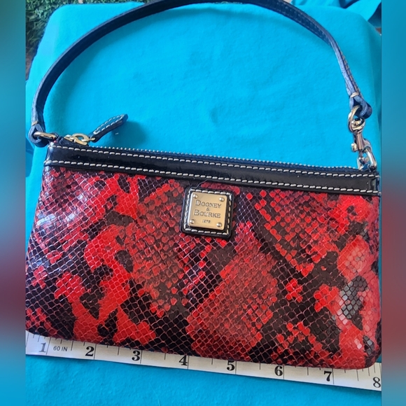 Dooney & Bourke Handbags - Dooney and bourke red and black snake skin clutch euc